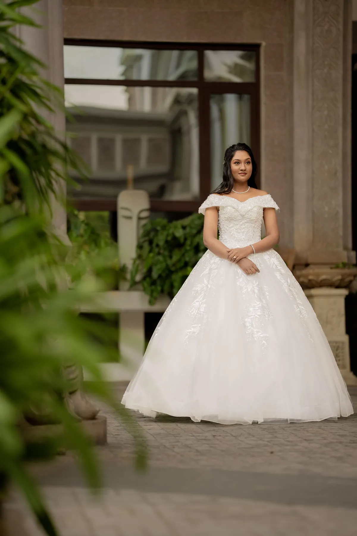 Bridal portrait among stone columns